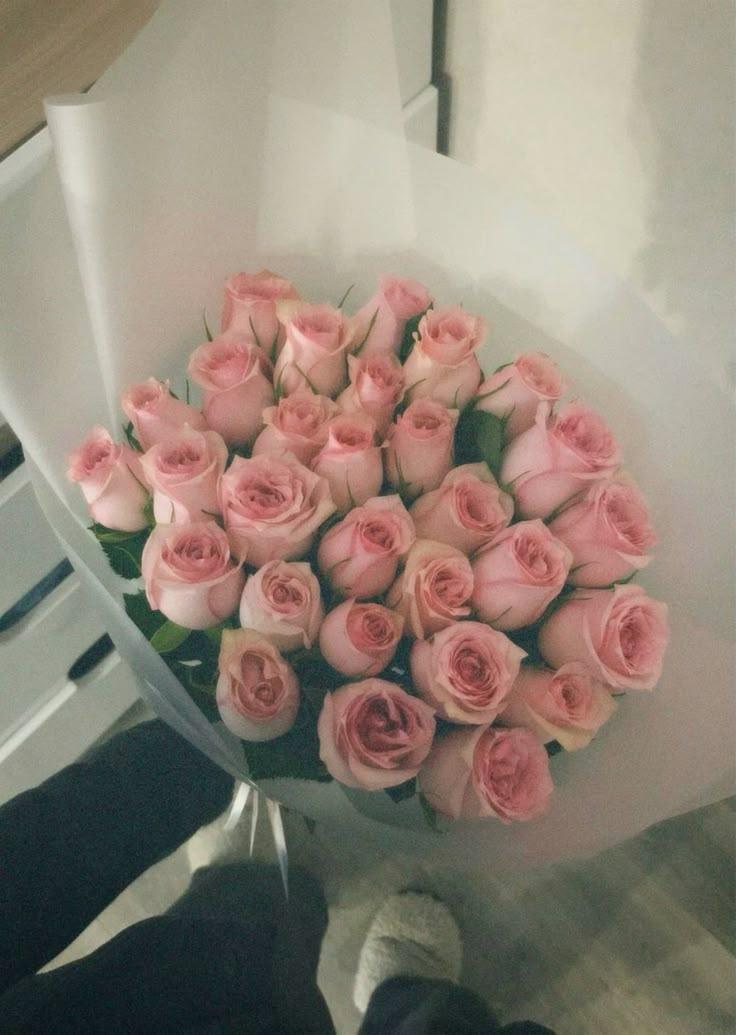 Corporate meeting room with meticulously scheduled floral displays maintaining elegance through the workday